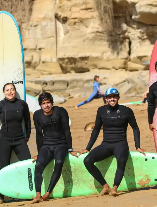 surf instructor with students in imsouane spot bay surf instructor with students in imsouane spot bay
